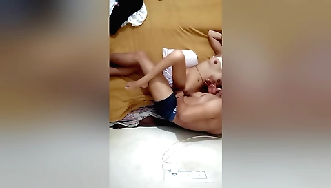 Indian girl with a shaved pussy plays with her lover's dick