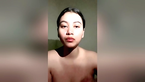 Solo masturbation of a beautiful brunette in her bedroom
