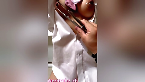Amateur girl is training her tits with a tongs and a bag