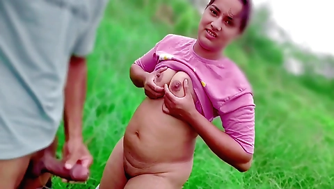 Sexy teen girl in a red bikini is on the jungle trail