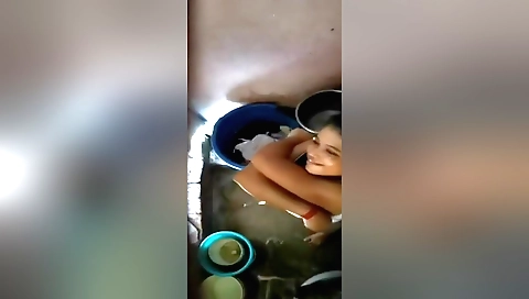 Sexy Indian babe in a black bikini naked in front of webcam