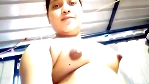 Bhabhi is a beautiful brunette who shows off her boobs
