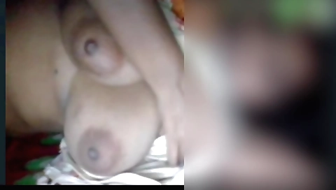 Sexy brunette girl with big natural tits in a solo video