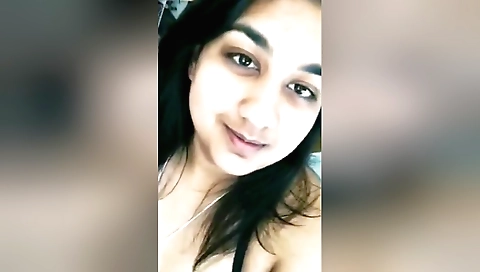 Sexy brunette shows off her legs on solo webcam video