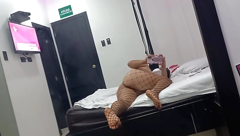 Sexy brunette in the solo female room in the night club