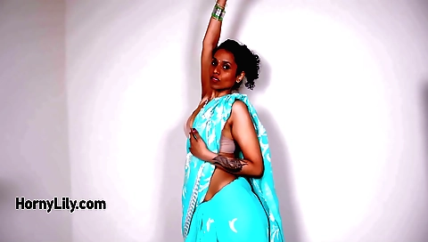 Indian solo dance scene with a brunette woman in a hot dress