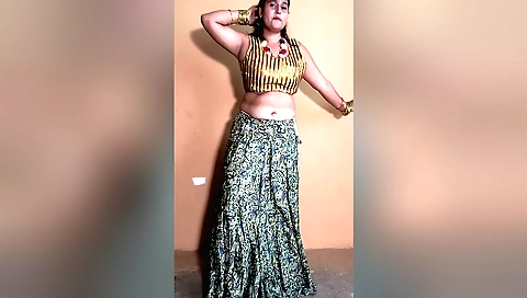 Indian hottie with big boobs is dancing and touching
