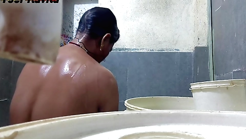 Indian woman masturbates in bathroom in her stepsister's house