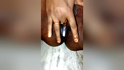 Indian brunette with a hairy pussy riding her cunt