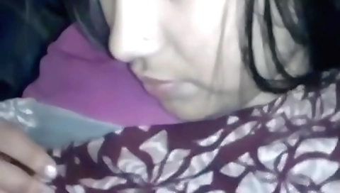 Indian pornstar in a bedroom porn clip with a hot babe