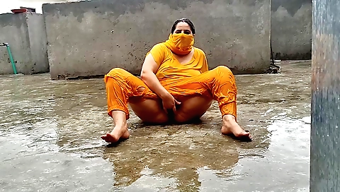 Indian brunette loves to have a rain shower with her boyfriend