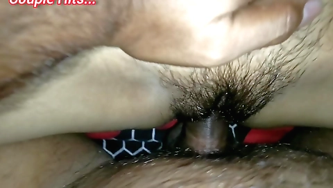 Indian babe gets on her knees and fucks her hairy cunt
