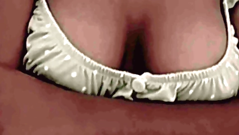 Busty brunette has fun with herself after masturbation