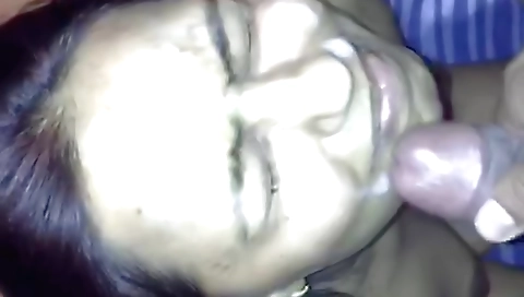 Busty Indian face in a cumshot face of a babe on cam